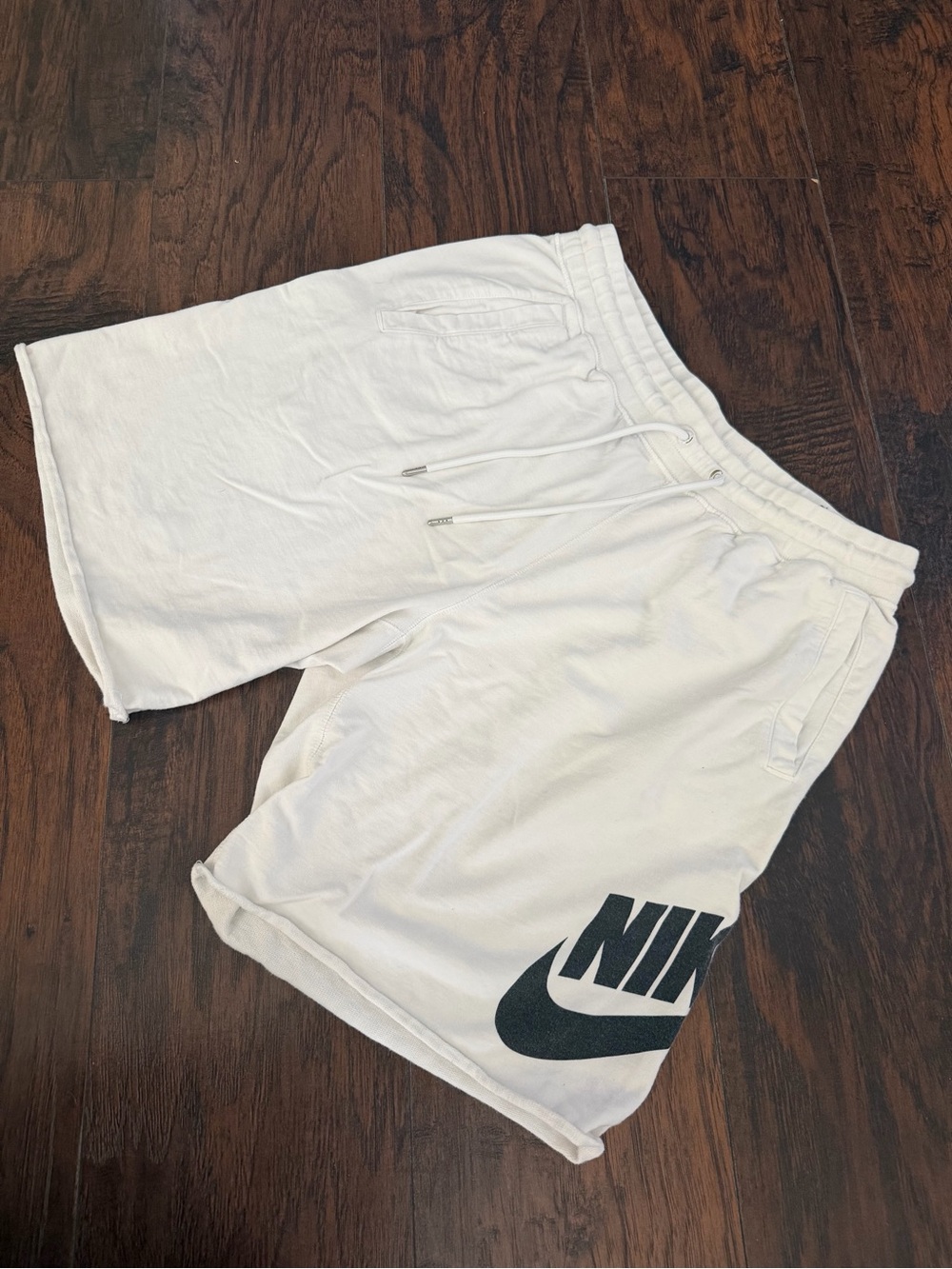 Nike White Athletic Shorts with Black Logo